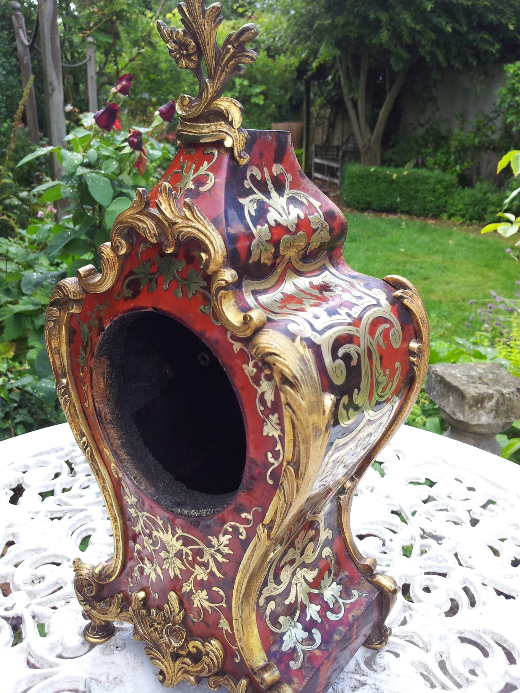 The restored Boulle marquetry clock case
