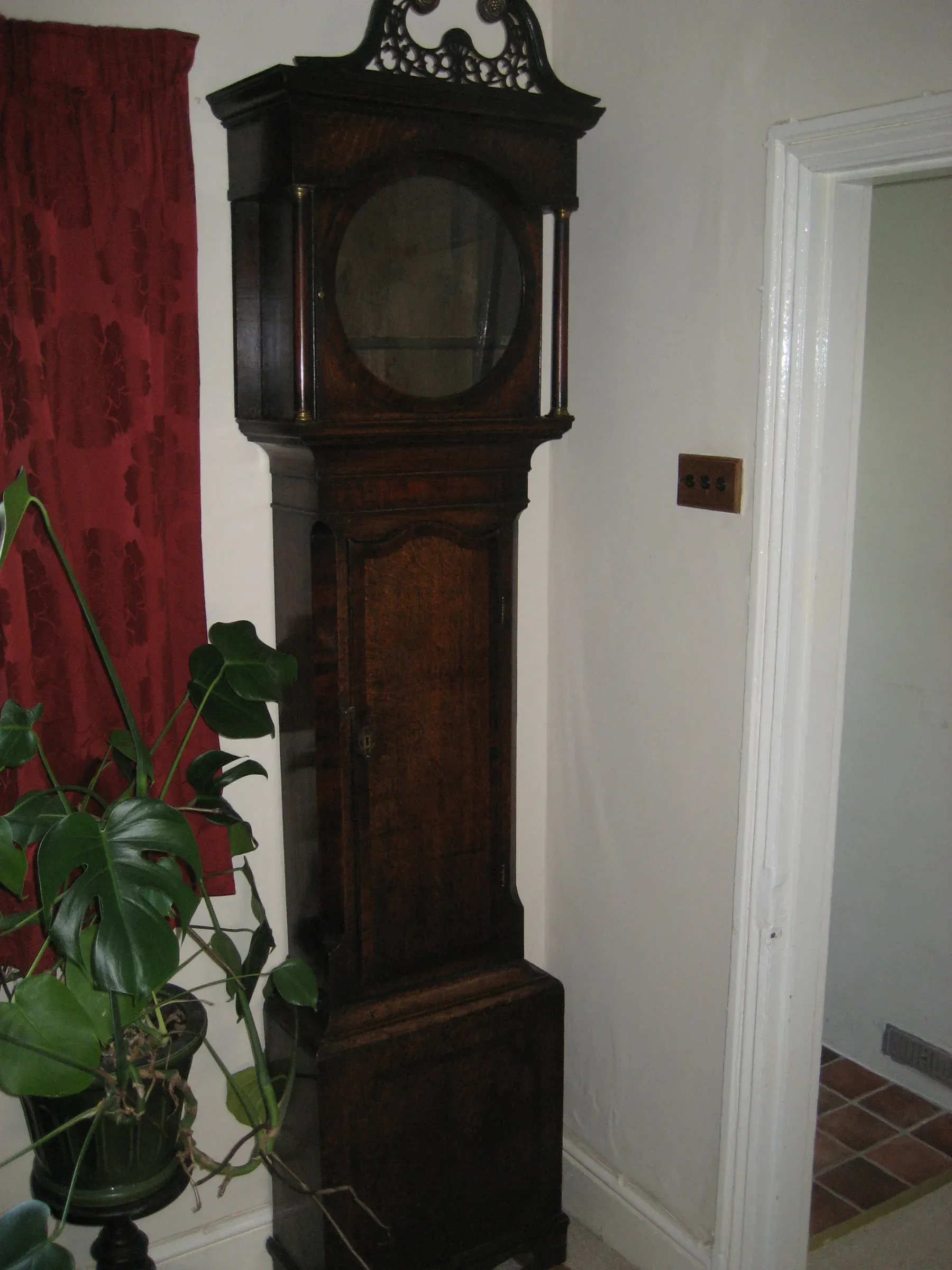 The hood after restoration - shown back on the trunk of the clock case