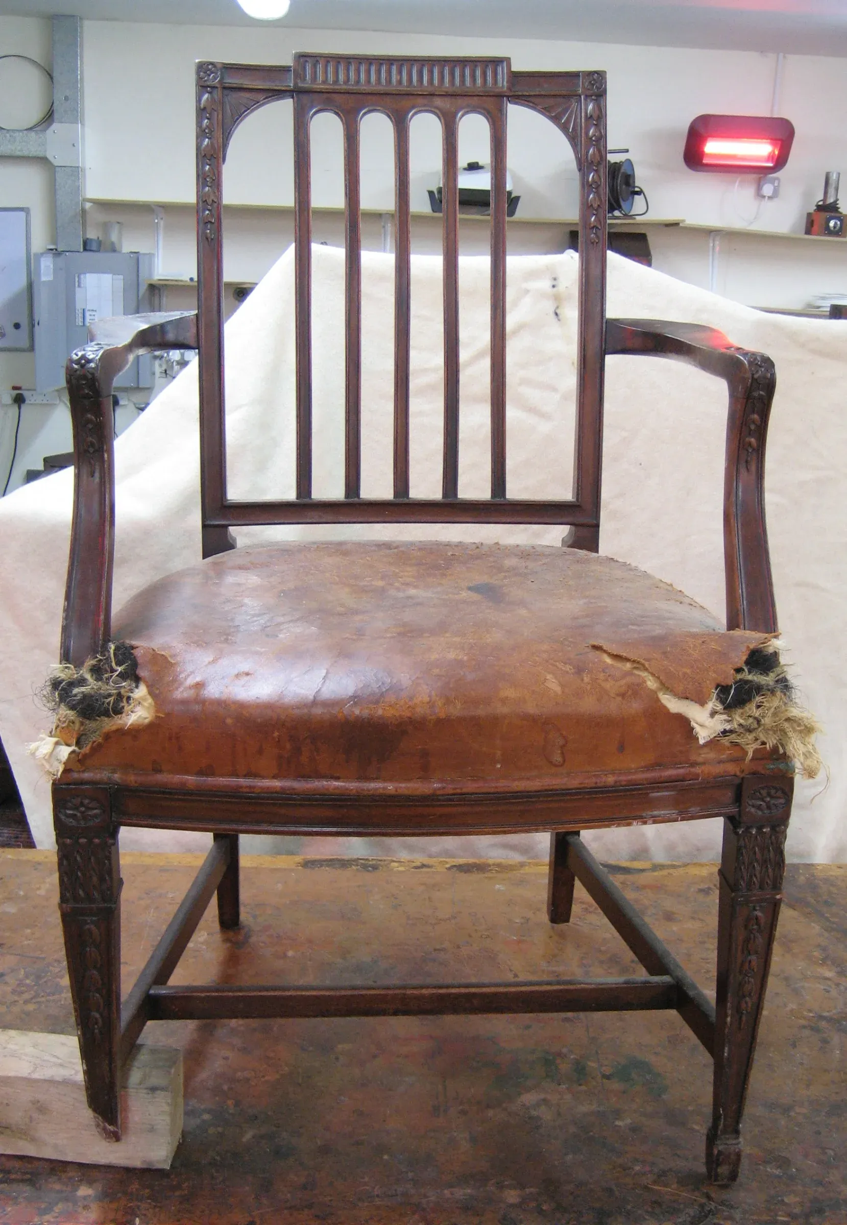 The chair as received with extensive damage