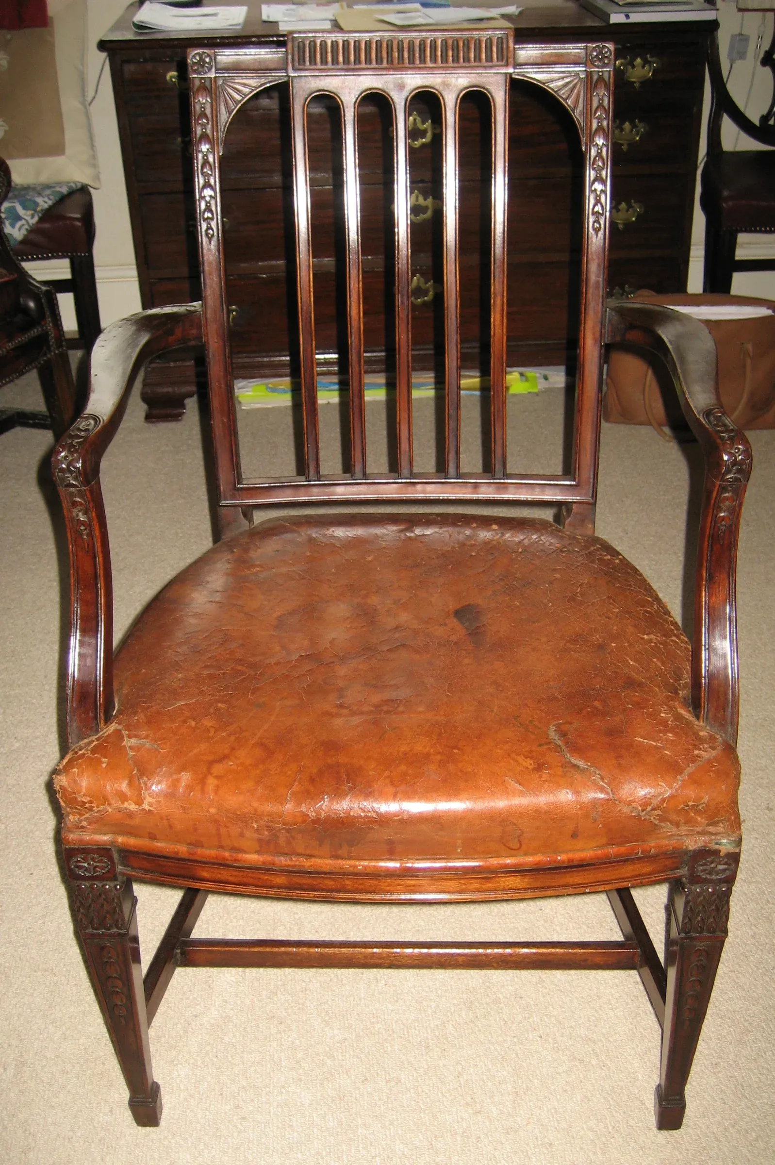 The finished chair after replacement leather had been fitted